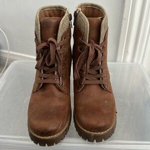 Carlos by Carlos Santana brown ankle boots with lug soles.